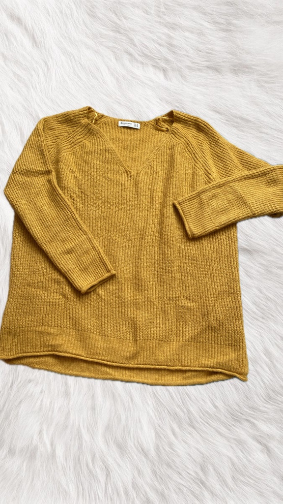 Suéter color mostaza de punto